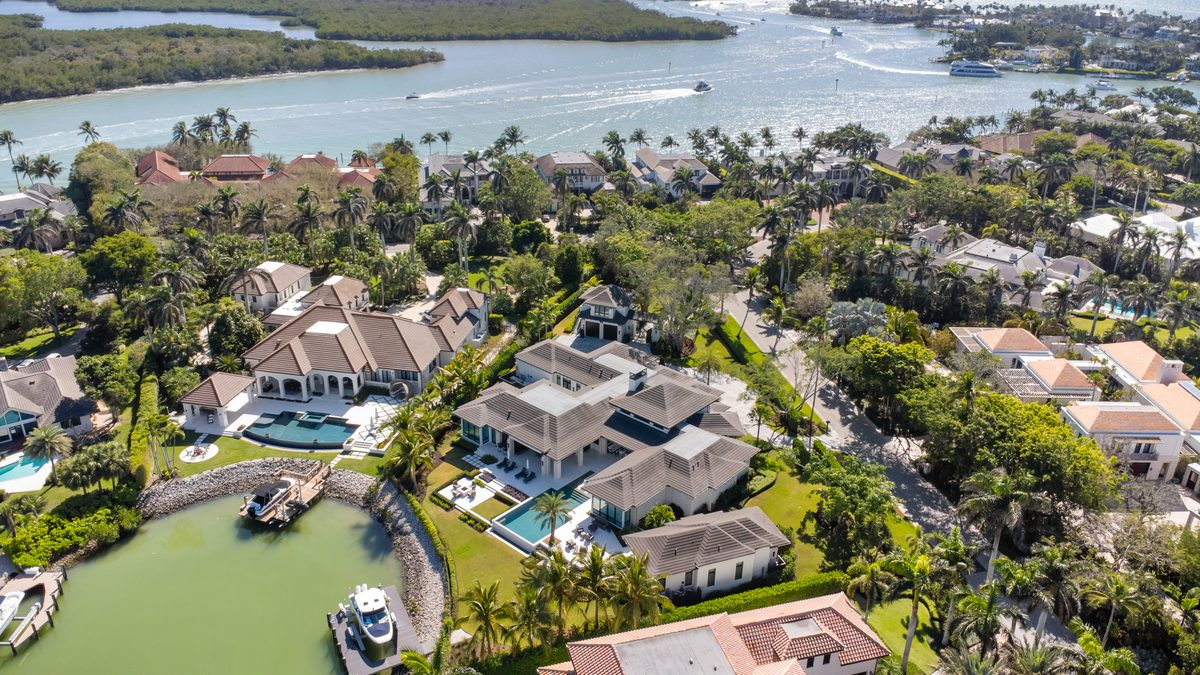 Aerial of waterfront homes and the bay
